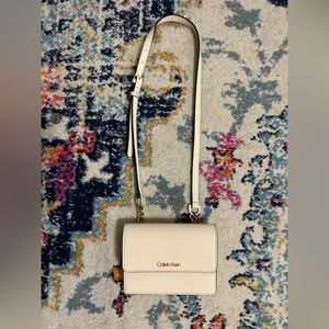 Cream colored Calvin Klein crossbody purse